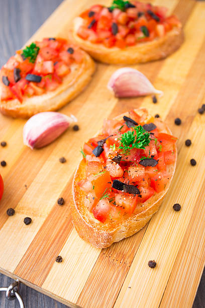 istock Tomato bruschetta topped with olive 185898355