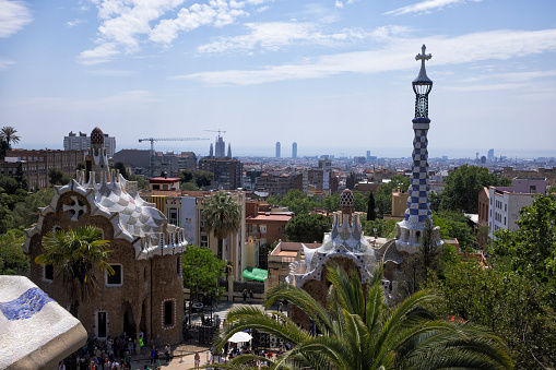 The stunningly vibrant colours and twisting shapes of the Spanish architect Gaudi's famous Parc Guell in Barcelona, Spain.