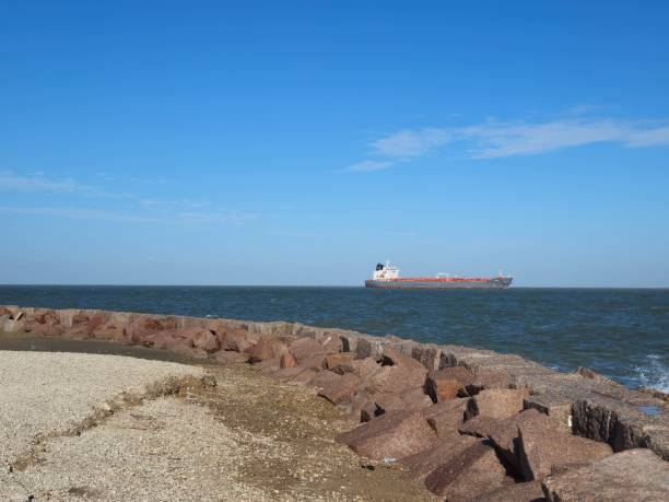 istock Freight Ship Sitting In The Ocean Background 1859010541