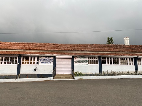 Coonoor, India - October 7 2023: Old colonial era plantation house with traditional architecture in the hill station town of Coonoor.