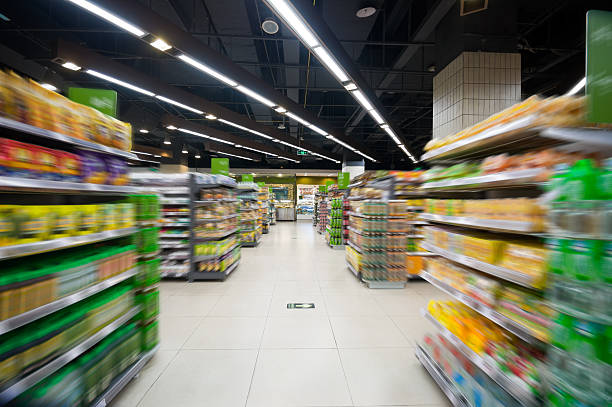 istock An empty supermarket aisle focused on white floors 185902493