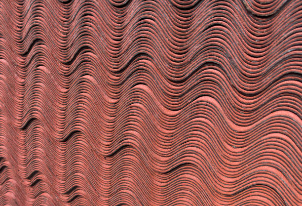 Asphalt roofing shingles texture background. Stack of house roof shingles