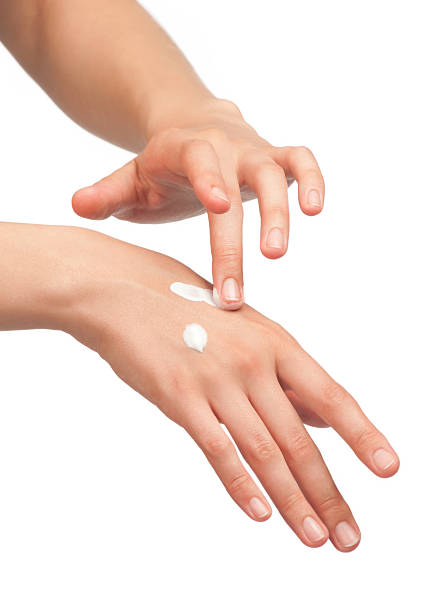 istock Woman applying hand cream 185911063