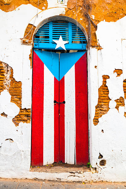 istock A shuttered window in San Juan painted as the flag 185916235
