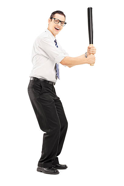 istock Person with a baseball bat prepared to strike 185919242