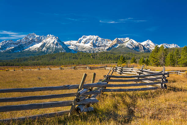 istock Idaho mountain range and log fence with snow 185919263