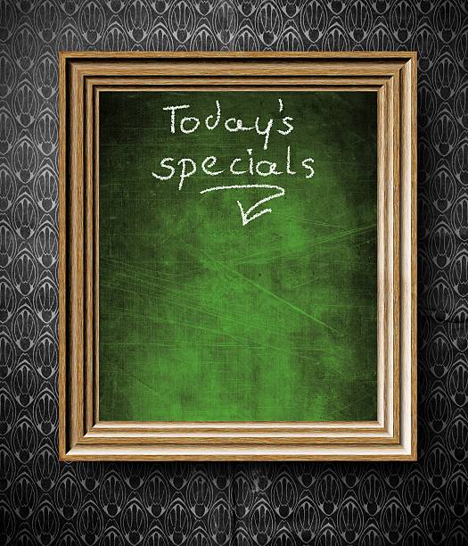 istock Todays special with copy-space chalkboard in old wooden frame 185920828
