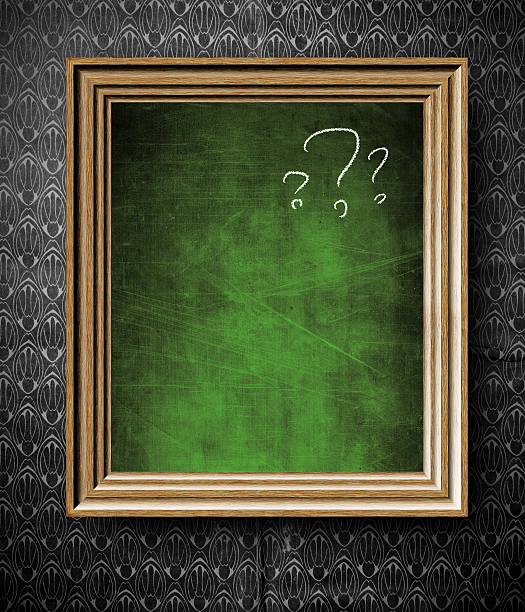 istock Question marks with copy-space chalkboard in old wooden frame 185920870