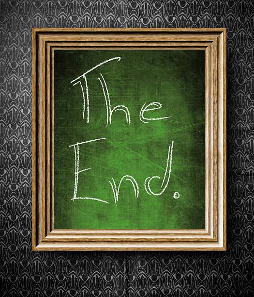 istock The End symbol chalkboard in old wooden frame 185920872