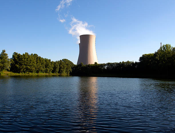istock Summer pond against nuclear plant 185922119