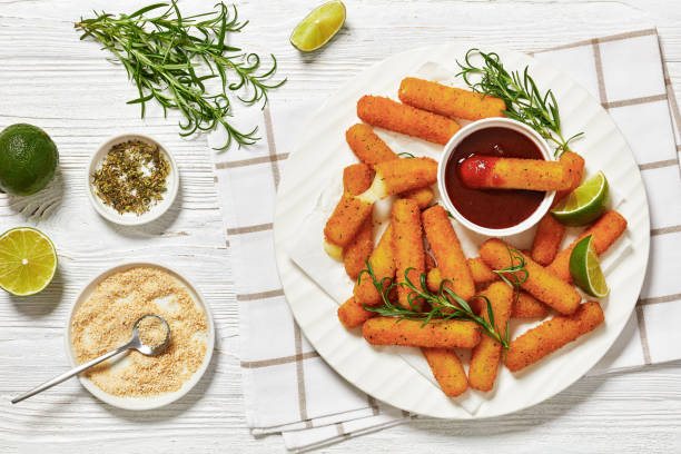 fried mozzarella sticks with sauce on white plate - mozzarella stick appetizer fried imagens e fotografias de stock