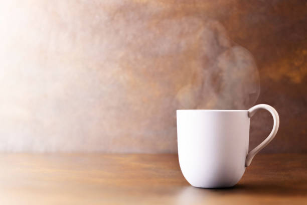 istock mug with steam escaping from the hot cup 1859236613