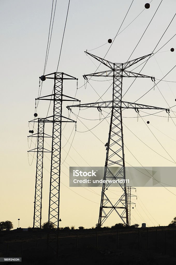 Elettricità Pali - Foto stock royalty-free di Acciaio