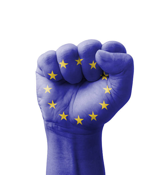 pugno di unione (unione europea) bandiera dipinta concetto, multiuso - euro symbol caucasian europe european culture foto e immagini stock
