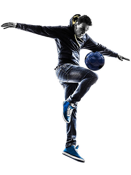 istock young man soccer freestyler player silhouette 185925152