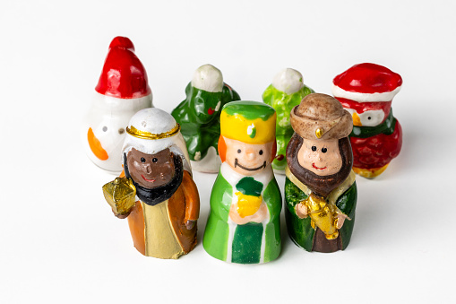 dolls that hide inside the Christmas dessert called Roscon de Reyes to follow the tradition and crown the person who finds it as king