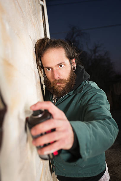 Man with Beard Spray Painting