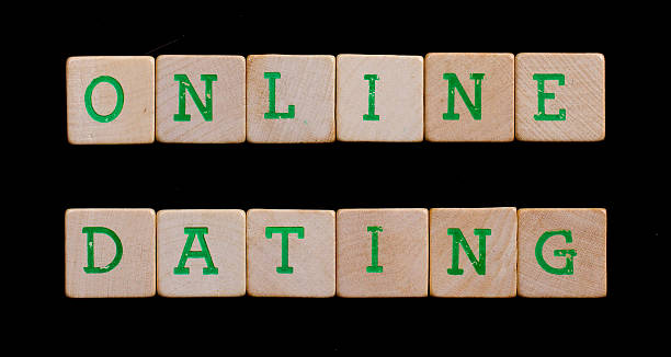 istock Green letters on old wooden blocks (online dating) 185926417