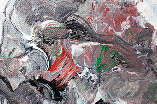 Abstract paint mixture with random pattern, red, green, gray, black and white, fluid brush strokes, soft focus close up