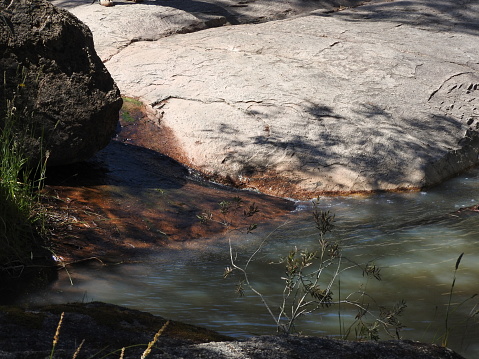 Running water over rocks from the Barry Falls near Eldorado in Victoria Australia