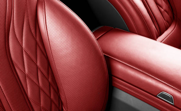 istock Car inside. Interior of prestige modern car. Comfortable red leather seats. Perforated leather cockpit.  Modern car interior details. 1859286554