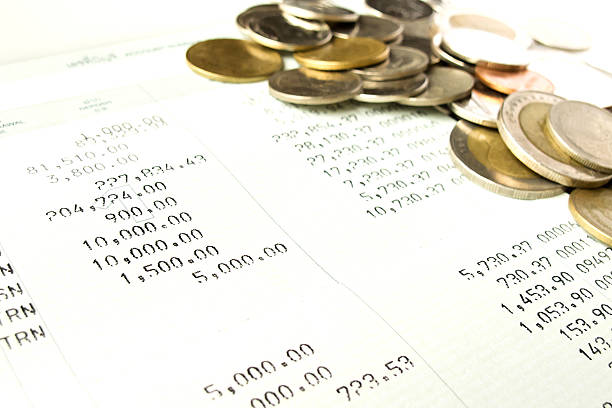 istock Saving deposit passbook with coins 185929328