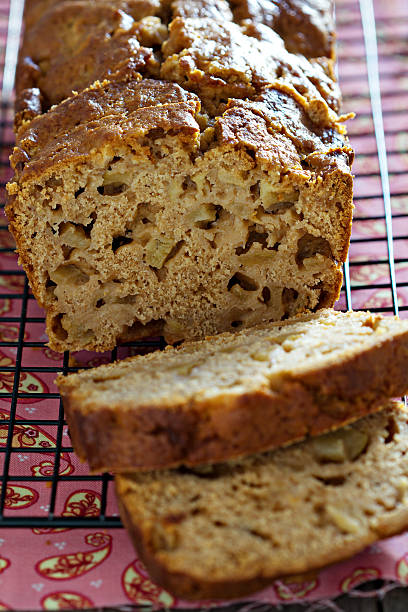 istock Cake with pieces of apples sliced on a cooling rack 185929451