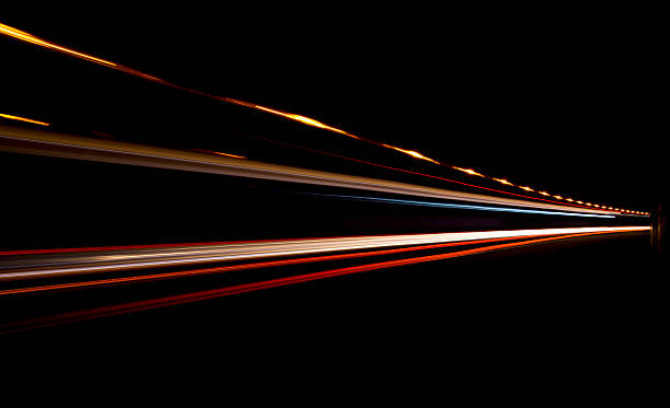 istock Truck light trails in tunnel. 185929506