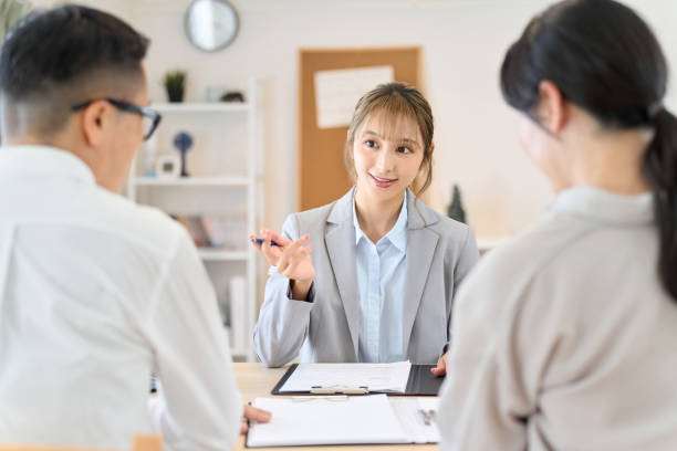 istock A female insurance agent giving information about insurance 1859323941