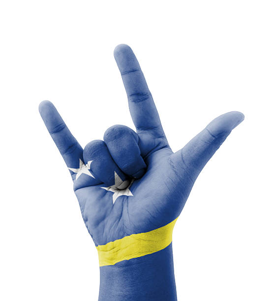 Hand making I love you sign, Curacao flag painted