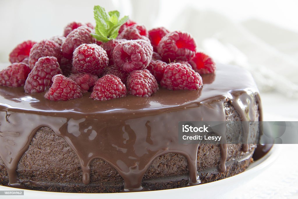 Chocolate cheesecake with raspberries. Backgrounds Stock Photo