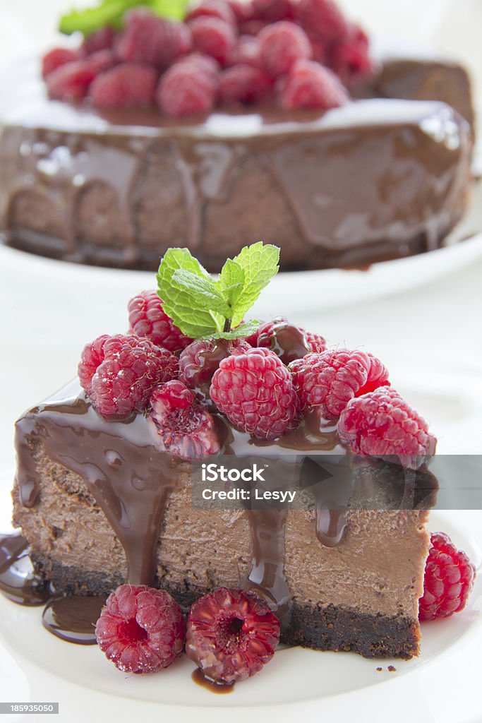 Chocolate cheesecake with raspberries. Backgrounds Stock Photo