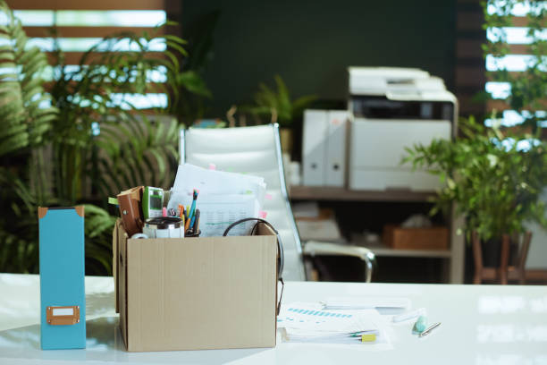 istock desk in modern green office 1859378824