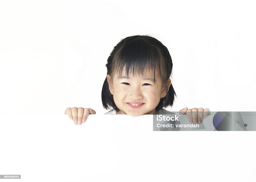 Asiatische Mädchen verstecken hinter Whiteboard - Lizenzfrei Ausstellung Stock-Foto