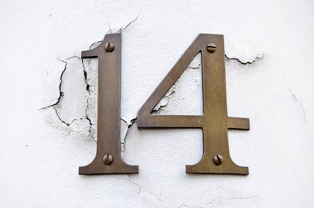 istock Number fourteen on cracked wall 185939405