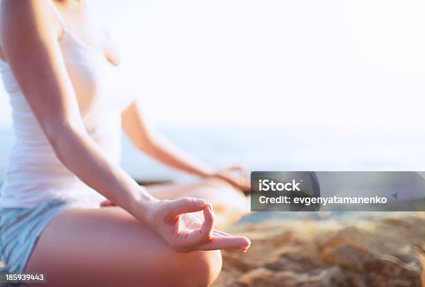Hand Of Woman Meditating In A Yoga Pose On Beach Stock Photo - Download Image Now - Activity, Adult, Beach