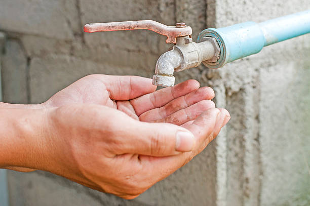 istock Hand wait for water from old faucet 185939955