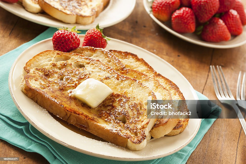 Homemade French Toast with Butter Homemade French Toast with Butter and Powdered Sugar Bread Stock Photo