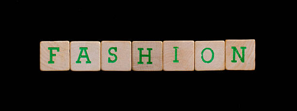 istock Green letters on old wooden blocks (fashion) 185944360