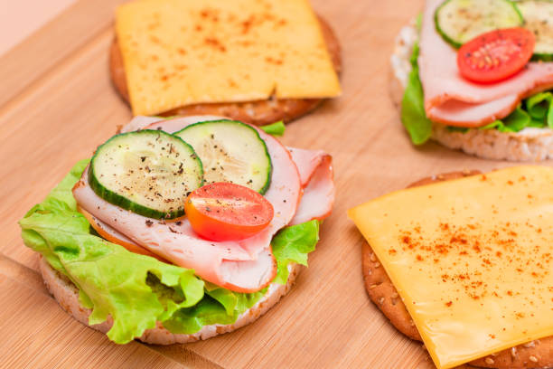 istock Rice Cakes with Ham, Tomato, Fresh Cucumber, Green Salad and Cheese 1859444954