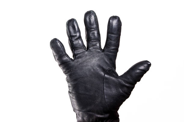 istock Motorcycle protective gear. Open hand in black leather glove isolated on white. Hello sign gesture. Winer clothing isolated. 1859453238