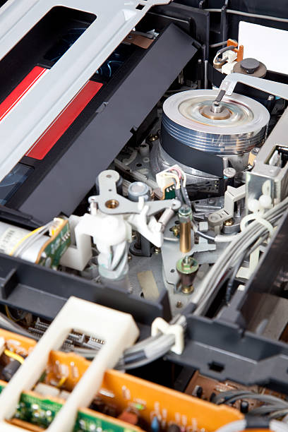 istock Interior of a VCR with cassette inserted and playing 185946383