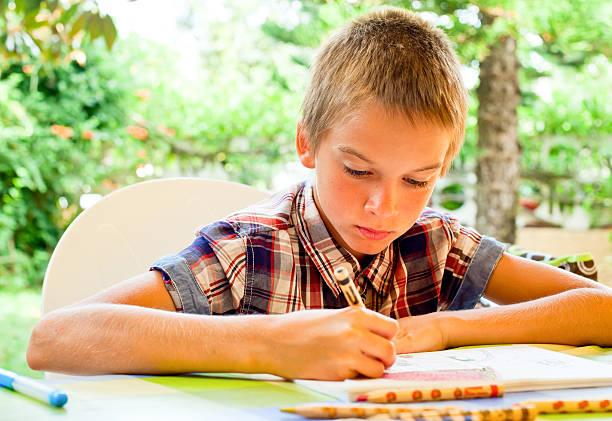 istock Child drawing outdoors 185947295