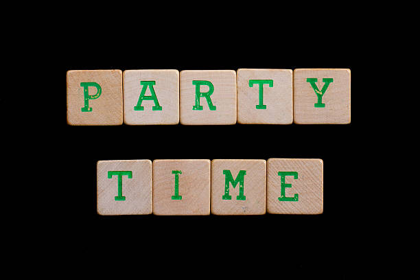 istock Party time spelled out in old wooden blocks 185947773