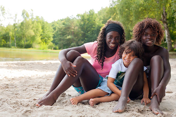 istock Happy ethnic children in the sand 185948077