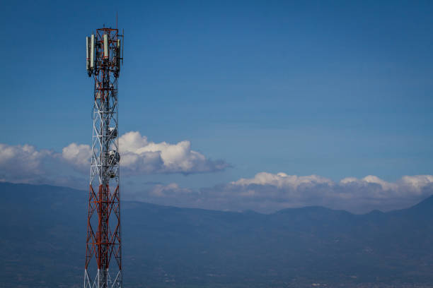 istock Telecommunication tower with 5G cellular network antenna on Mountain and blue sky background 1859487580