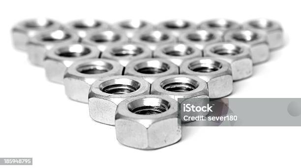 Foto de Camada De Metal Nozes e mais fotos de stock de Amontoamento - Amontoamento, Aço, Aço Inoxidável