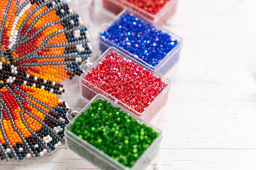 Colorful glass beads. Variety of shapes and colors to make a bead necklace or a string of beads women