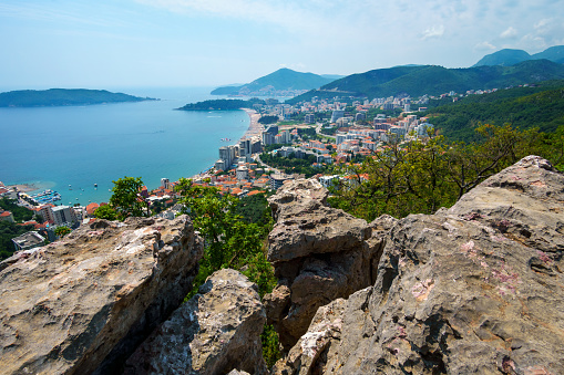 panoramic view from the height of the mountains to the resort town on the seashore, Montenegro, Adriatic Sea, beaches, islands, tourism and travel, summer vacations