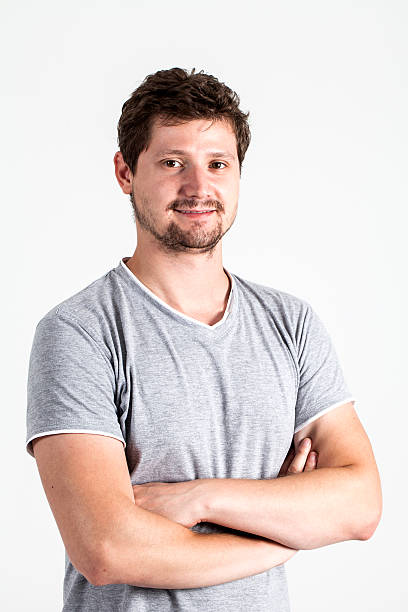 istock Portrait of a smiling young man 185955788